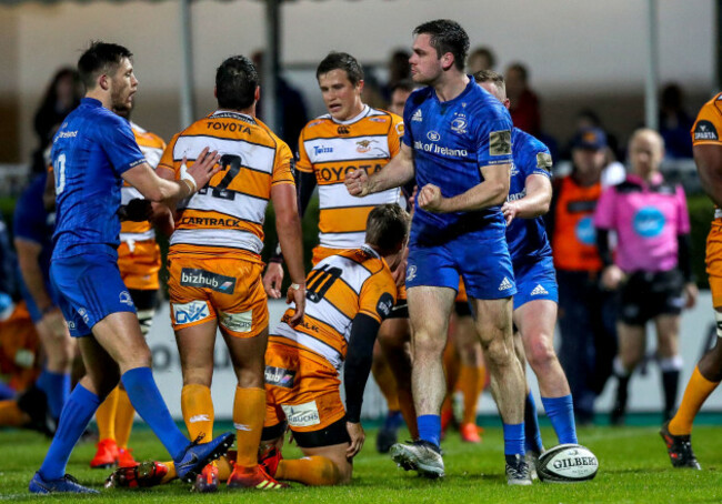 Conor O’Brien celebrates scoring a try with Ross Byrne