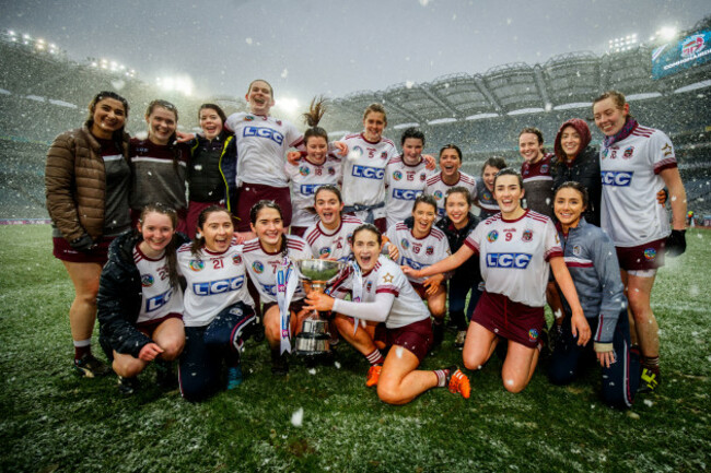 Slaughtneil celebrate with the trophy after the game