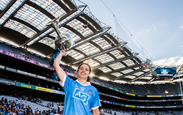 Noelle Healy celebrates with the trophy