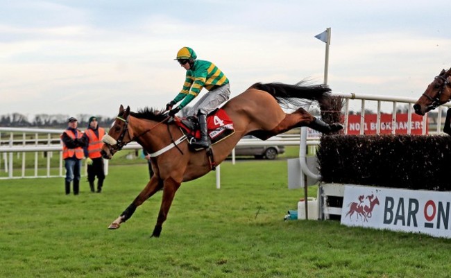 Coney Island ridden by Mark Walsh clears the last on the way to winning