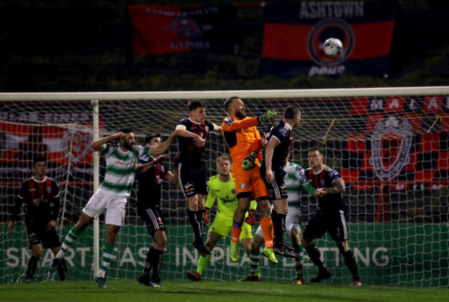 Alan Mannus comes up for a late corner