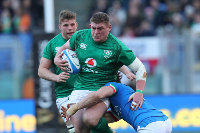 Ireland’s Tadhg Furlong is tackled by Italy's Leonardo Ghiraldini