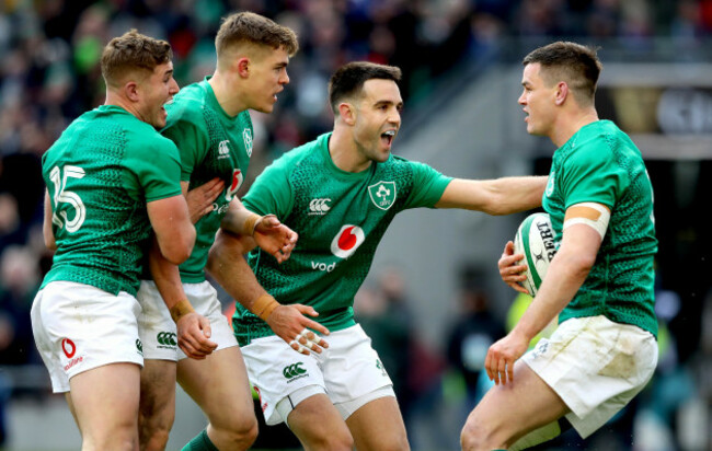 Jonathan Sexton celebrates scoring their second try with Jordan Larmour, Garry Ringrose and Conor Murray