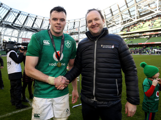 James Ryan is presented with the Man of the Match award by Willie Ahearne