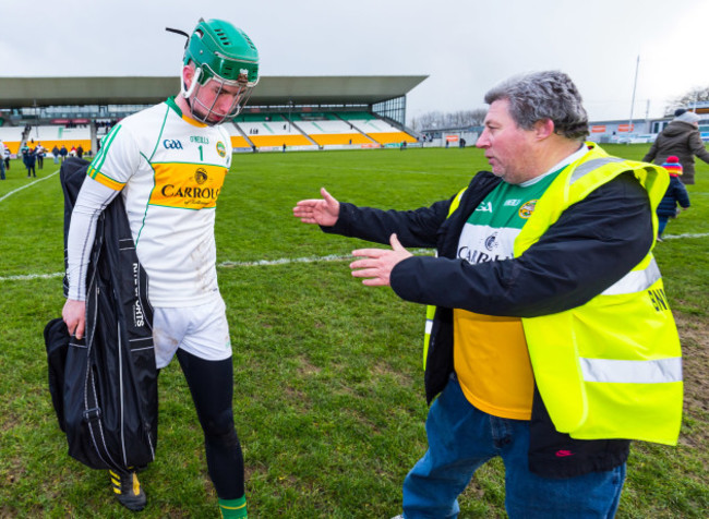 Eoghan Cahill is consoled by Mick McDonagh