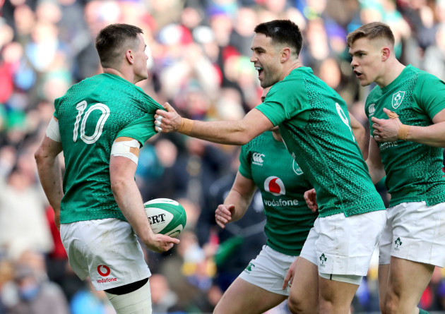 Jonathan Sexton celebrates scoring their second try with Conor Murray and Garry Ringrose