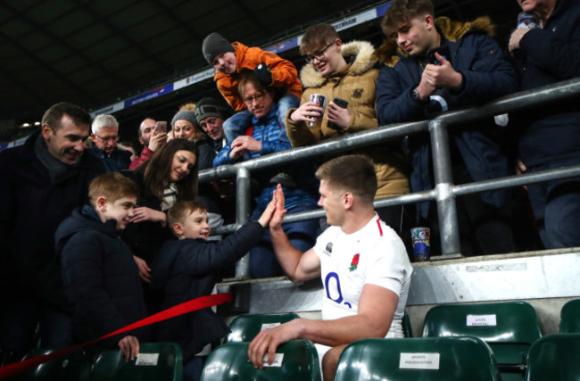 Owen Farrell high fives young fans