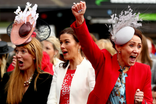 Friends of best dressed winner Eimear Cassidy celebrate as she is announced the winner