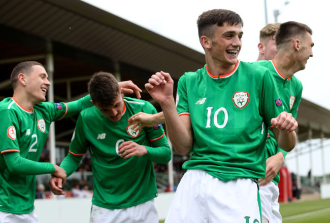 Troy Parrott celebrates scoring their first goal with teammates