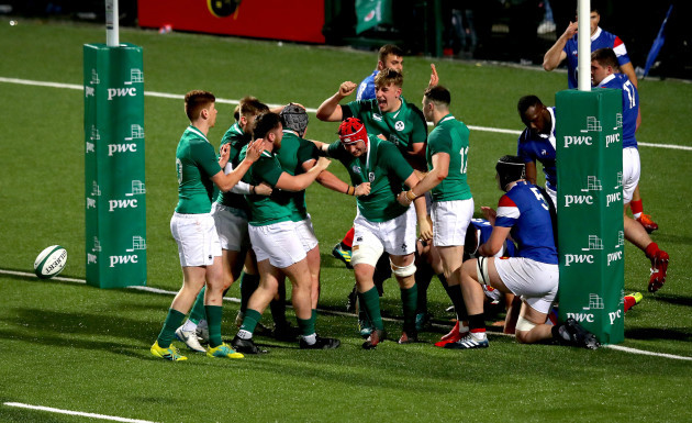 Ireland players celebrate Josh Wycherley scoring a try