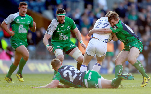 Andrew Browne and AJ MacGinty tackle Ian Madigan