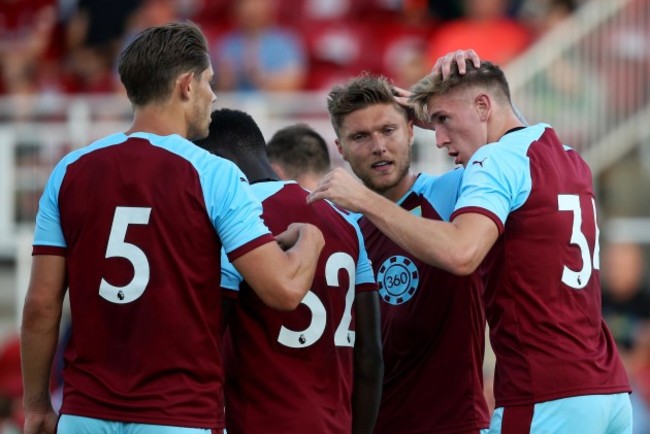 Jimmy Dunne celebrates scoring a goal with teammates