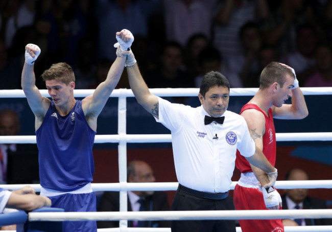 Luke Campbell celebrates as John Joe Nevin is dejected