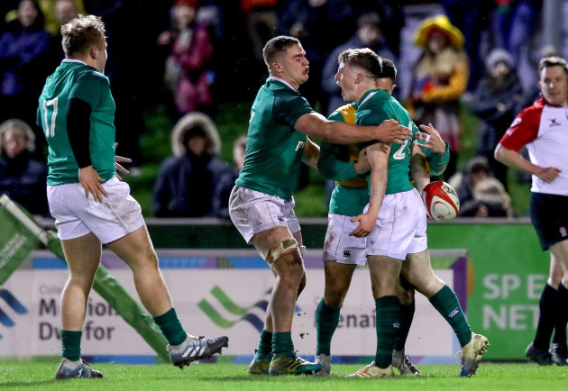 Colm Reilly celebrates his try with Scott Penny