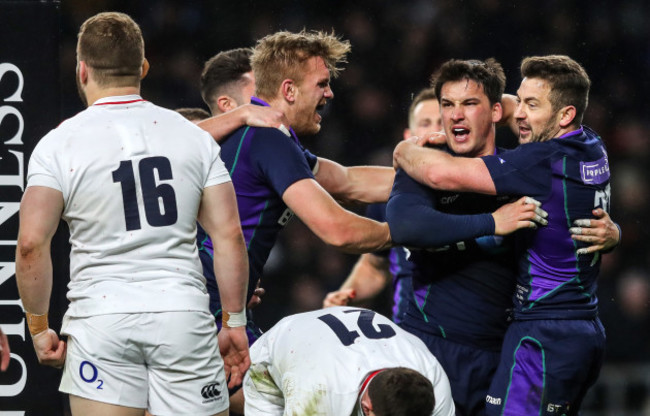 Sam Johnson celebrates scoring a try to take the lead