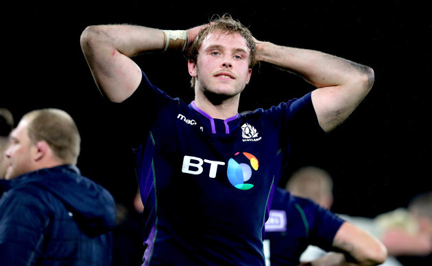 Jonny Gray dejected after the game ends in a draw