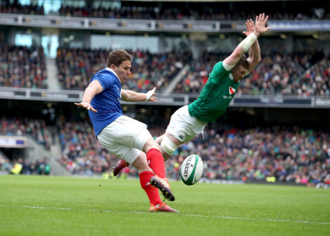 Peter O'Mahony charges down Antoine Dupont's kick