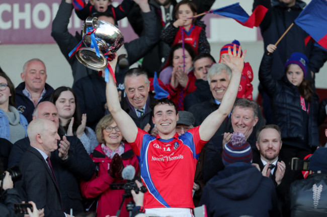 Conor Cooney lifts the trophy