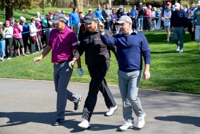 Padraig Harrington, Shane Lowry and Paul McGinley between holes