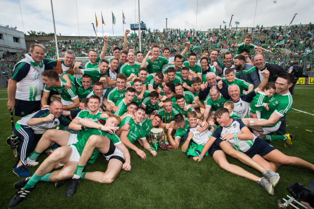 Limerick celebrates after the game with the Liam MacCarthy