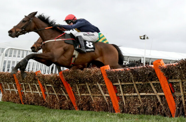 Mark Walsh on City Island wins the Ballymore Novices' Hurdle ahead of Barry Geraghty on Champ
