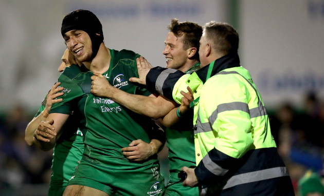 Ultan Dillane celebrates his try with Jack Carty