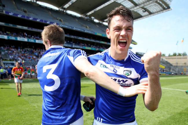 John O'Loughlin and Mark Timmons celebrate after the game