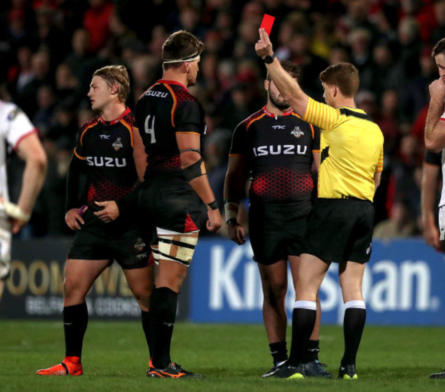 Lloyd Linton shows Tertius Kruger a red card