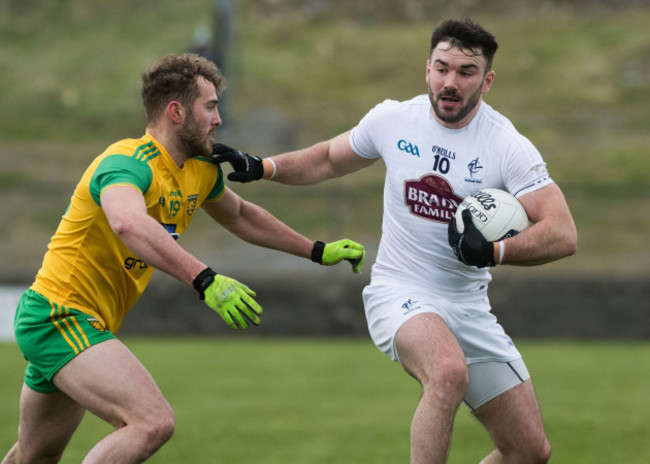 Fergal Conway holds off the challenge of Stephen McMenamin