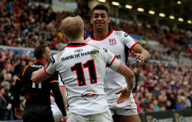 Rob Lyttle celebrates scoring a try with Robert Baloucoune