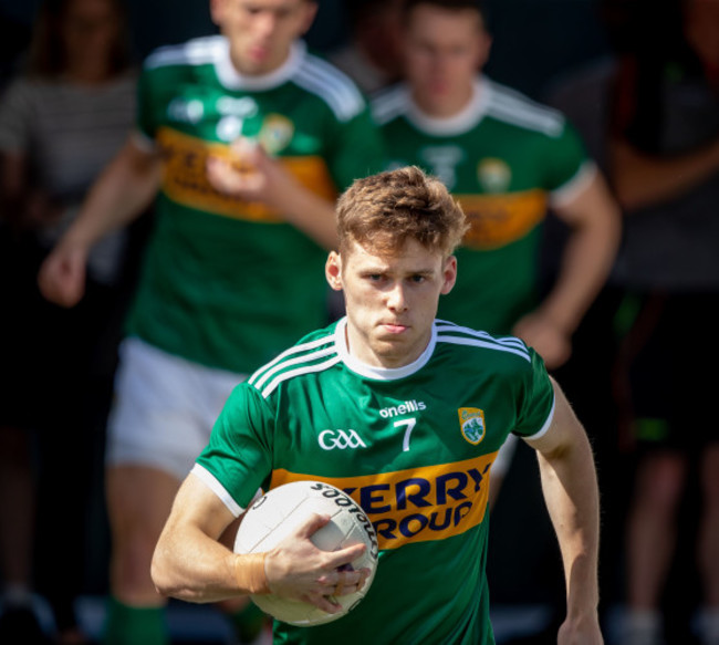 Gavin White leads the team out