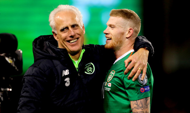 Mick McCarthy celebrates with James McClean after the game