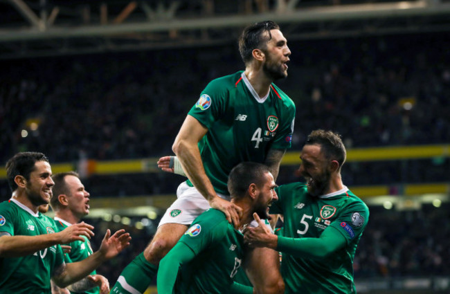 Conor Hourihane celebrates scoring a goal with Robbie Brady, Shane Duffy and Richard Keogh