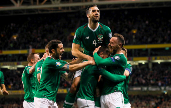 Conor Hourihane celebrates scoring a goal with Robbie Brady, Shane Duffy and Richard Keogh