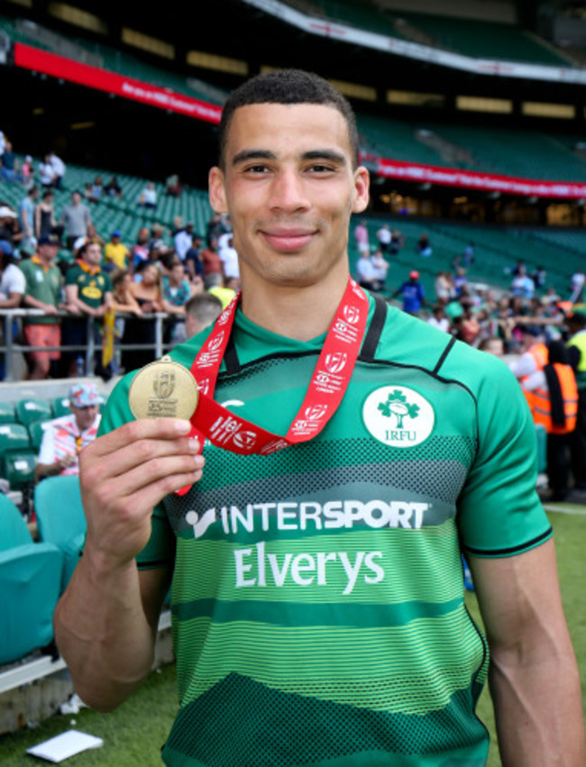 Jordan Conroy celebrates with his bronze medal