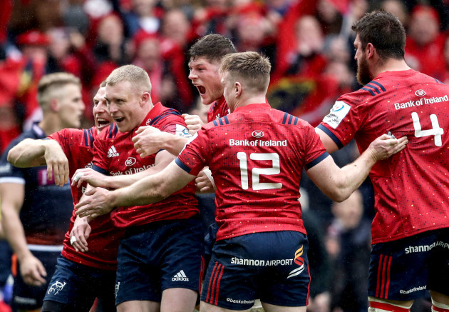 Keith Earls celebrates scoring their first try with teammates