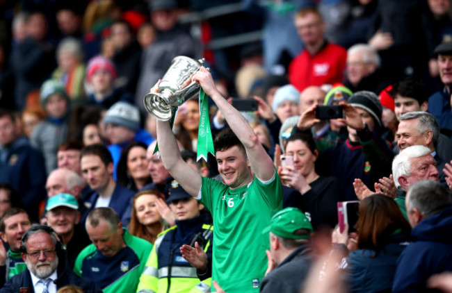 Declan Hannon lifts the trophy