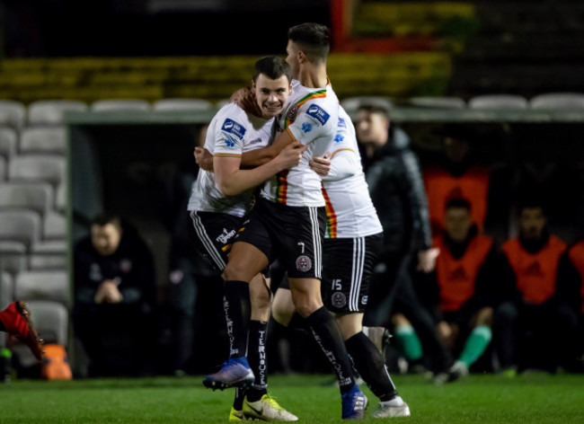 James Finnerty celebrates scoring their equalising goal with Danny Mandroiu