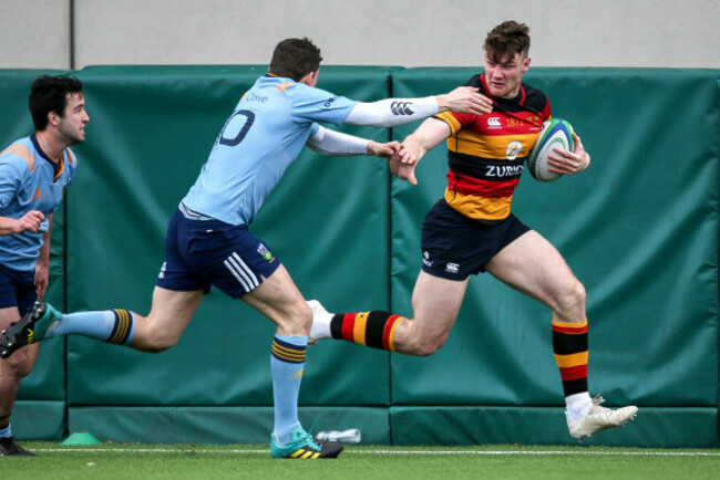 Peter Sullivan on his way to scoring a try despite Matt Gilsenan