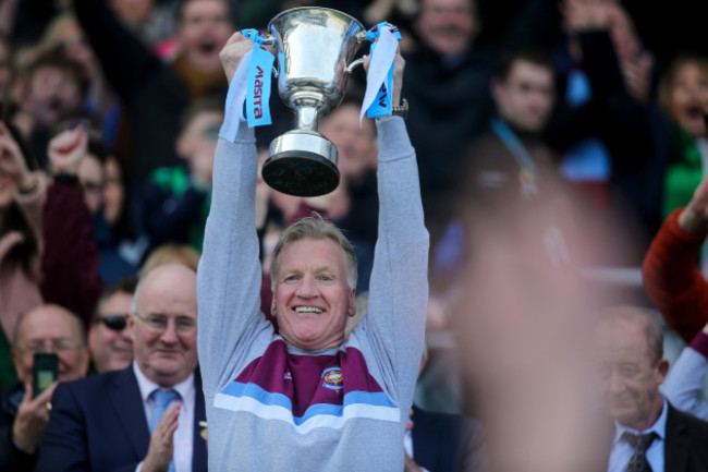 Dominic Corrigan lifts the trophy