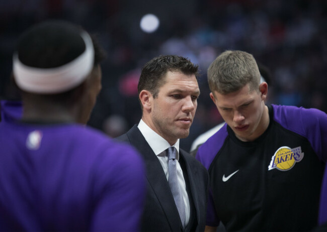 Lakers beat Clippers, 122-117.