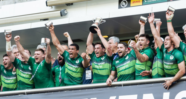 Billy Dardis lifts the trophy and celebrates winning the final with teammates