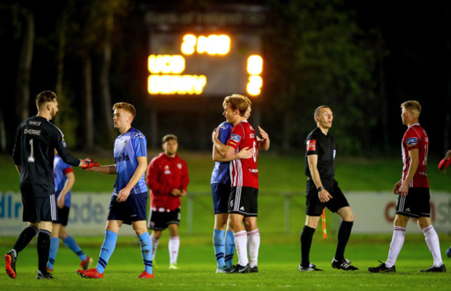 Liam Scales and Greg Sloggett at the full time whistle