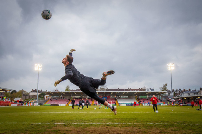 Tadhg Ryan warms up before the game