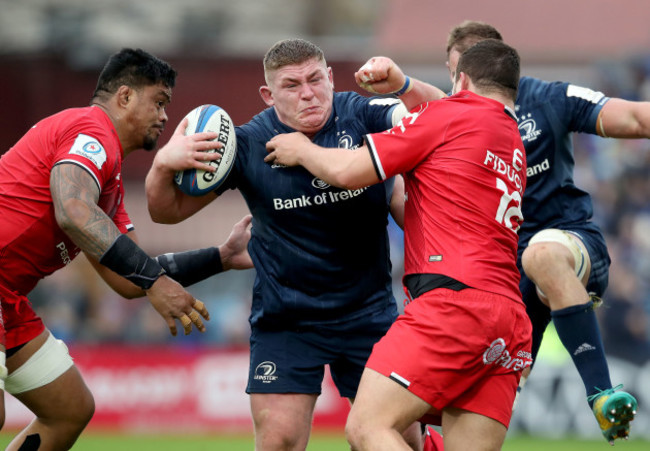 Tadhg Furlong tackled by Joe Tekori and Dorian Aldegheri