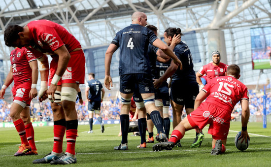 James Lowe celebrates scoring his sides first try with Devin Toner