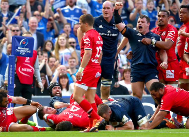 Cian Healy celebrates after Luke McGrath scored his sides second try