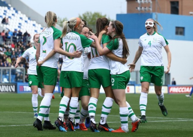 Katie McCabe celebrates scoring their first goal with teammates