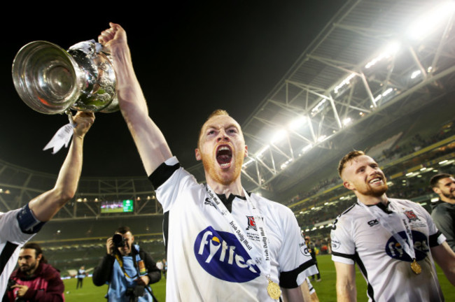 Chris Shields after the game with the trophy