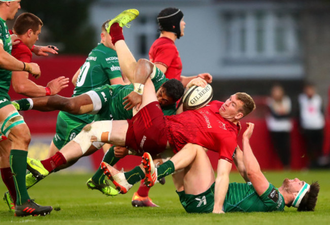 Bundee Aki and Tom Daly tackle Chris Farrell